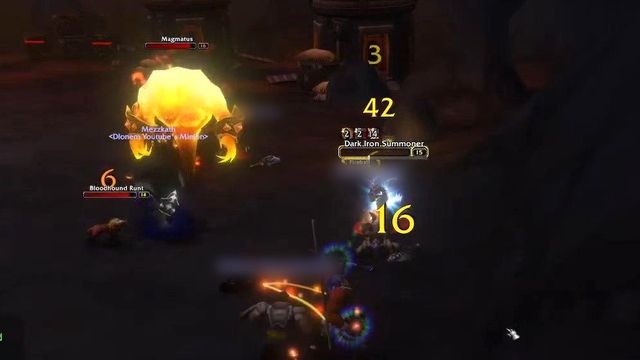 A glowing fire elemental, Magmatus, fighting a group in a dark cavern